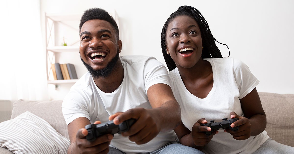 Couple plays a video game together