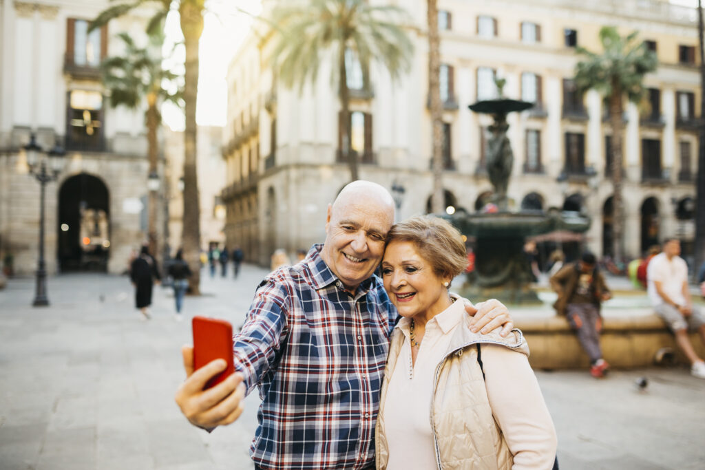 Senior tourists taking a selfie on vacation